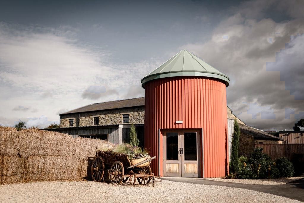 The red silo and stone barn at Runa Farm, Barnard Castle